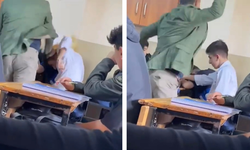 Sınıfın ortasında öğrencisini kitapla dövdü
