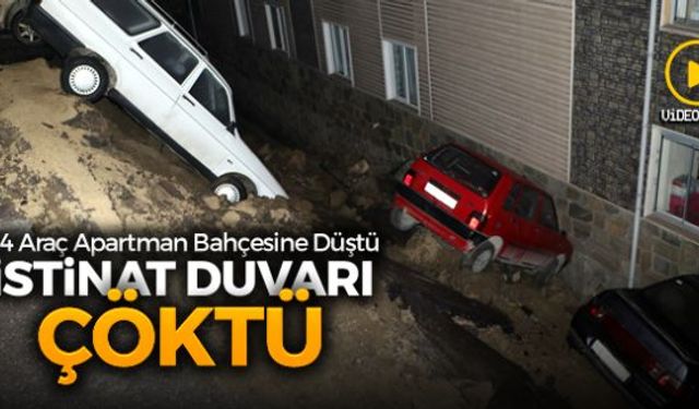 Gece yarısı bir sitenin istinat duvarı çökmesi sonrası 4 araç apartman bahçesine düştü