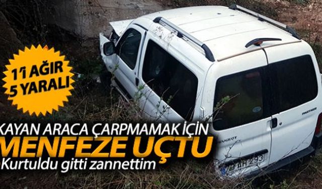 Kayan araca çarpmamak için sürücüsünün manevra yaptığı hafif ticari araç menfeze uçtu