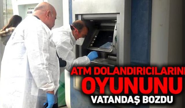 Bir kamu bankasına ait ATMsine iki şahsın dolandırıcılık amacıyla kart kopyalama düzeneği yerleştirdiğini fark edince durumu polise bildirdi