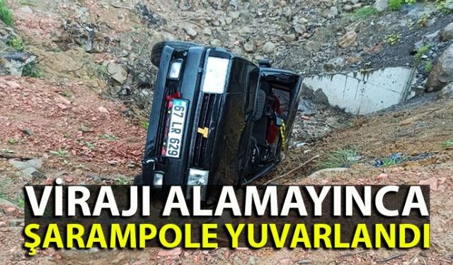 Zonguldakın Ereğli ilçesinde sürücüsünün direksiyon hâkimiyetini kaybeden otomobil şarampole yuvarlandı