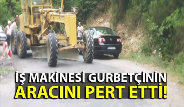 Zonguldak'ın Kozlu ilçesine bağlı Sivriler yolu üzerinde meydana gelen kazada iş makinesi ile otomobil çarpıştı