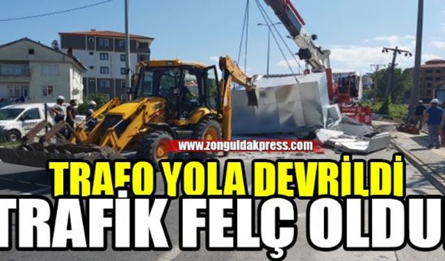 Zonguldakın Ereğli İlçesinde yola düşen trafo trafiğin kilitlenmesine neden oldu